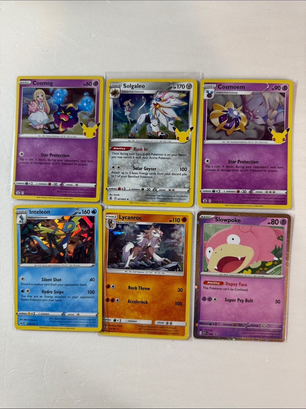 Pokemon Trading Cards - Purple, Yellow, Blue, Orange